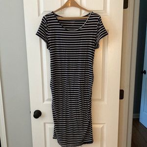 Knee length maternity dress.